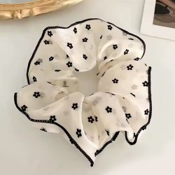 scrunchie transparent blanc cassé à fleurs noires